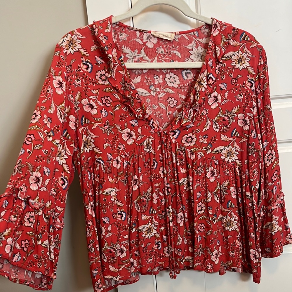 Red blouse with flowy sleeve